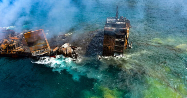 The MV X-Press Pearl sinks as it is towed into the deep sea off Colombo, Sri Lanka, after a fire